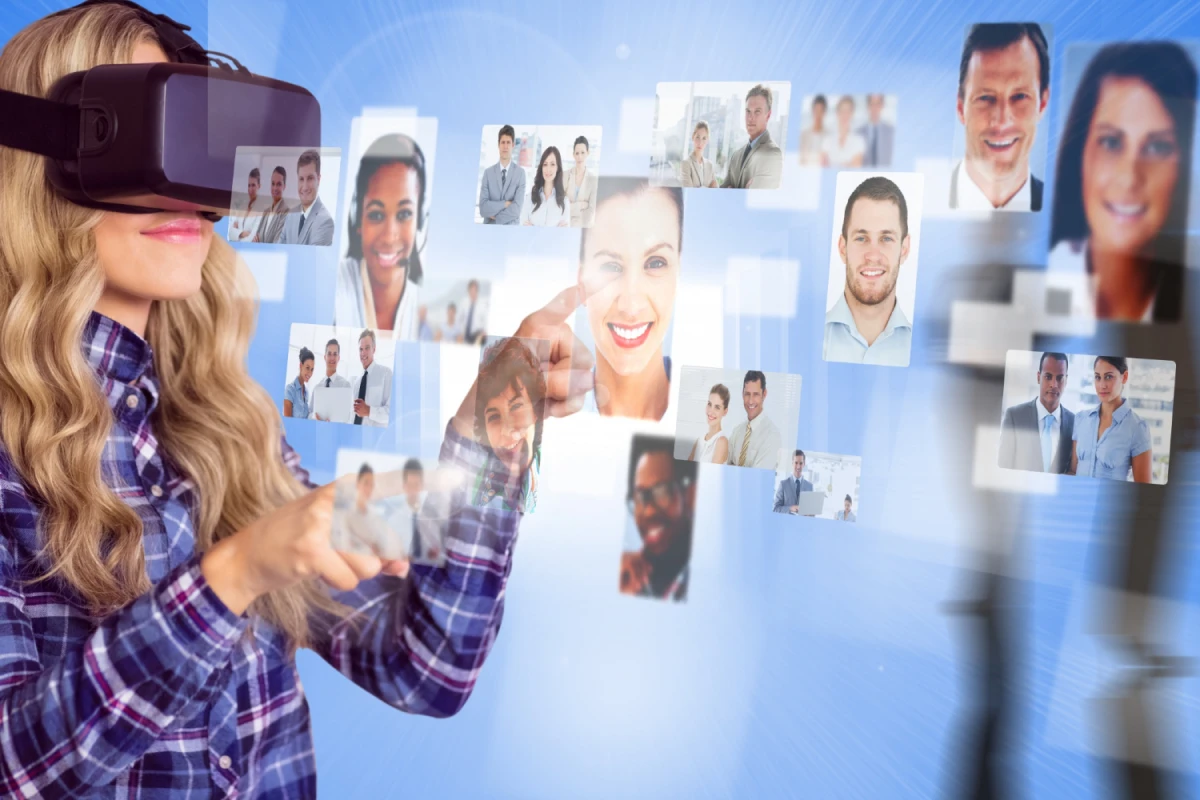 Woman in VR headset interacting with floating profile images on a digital interface.