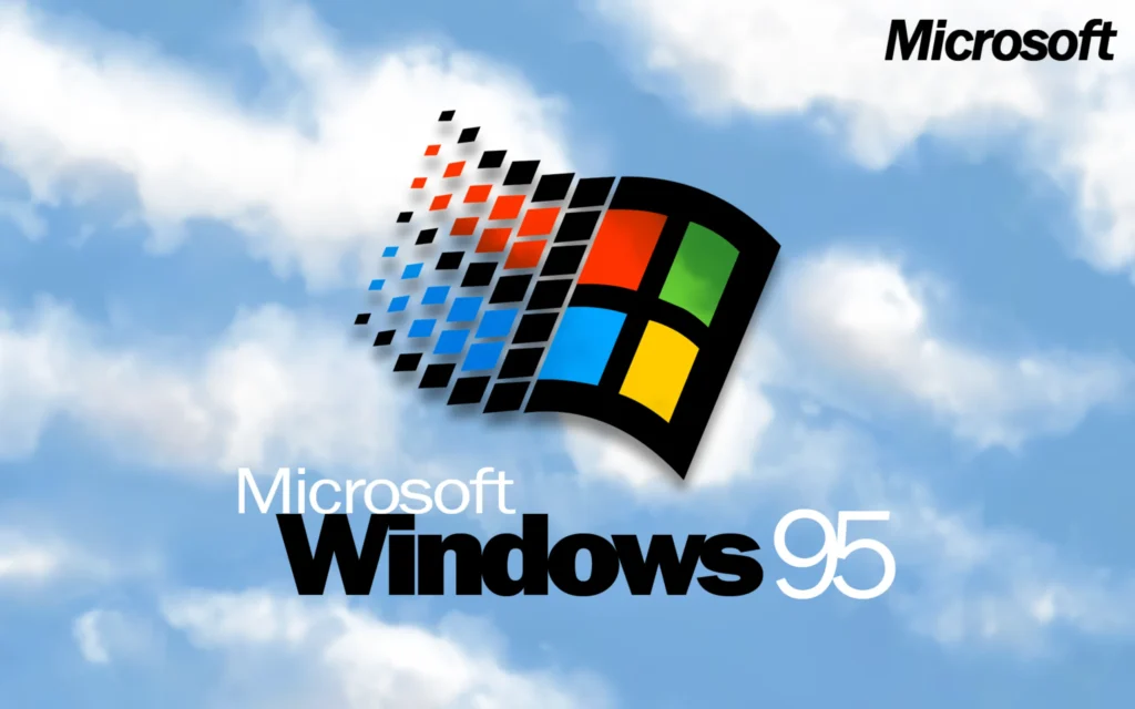 The classic Microsoft Windows 95 logo against a cloudy sky background, featuring the iconic flag with red, green, blue, and yellow panels breaking into pixels.