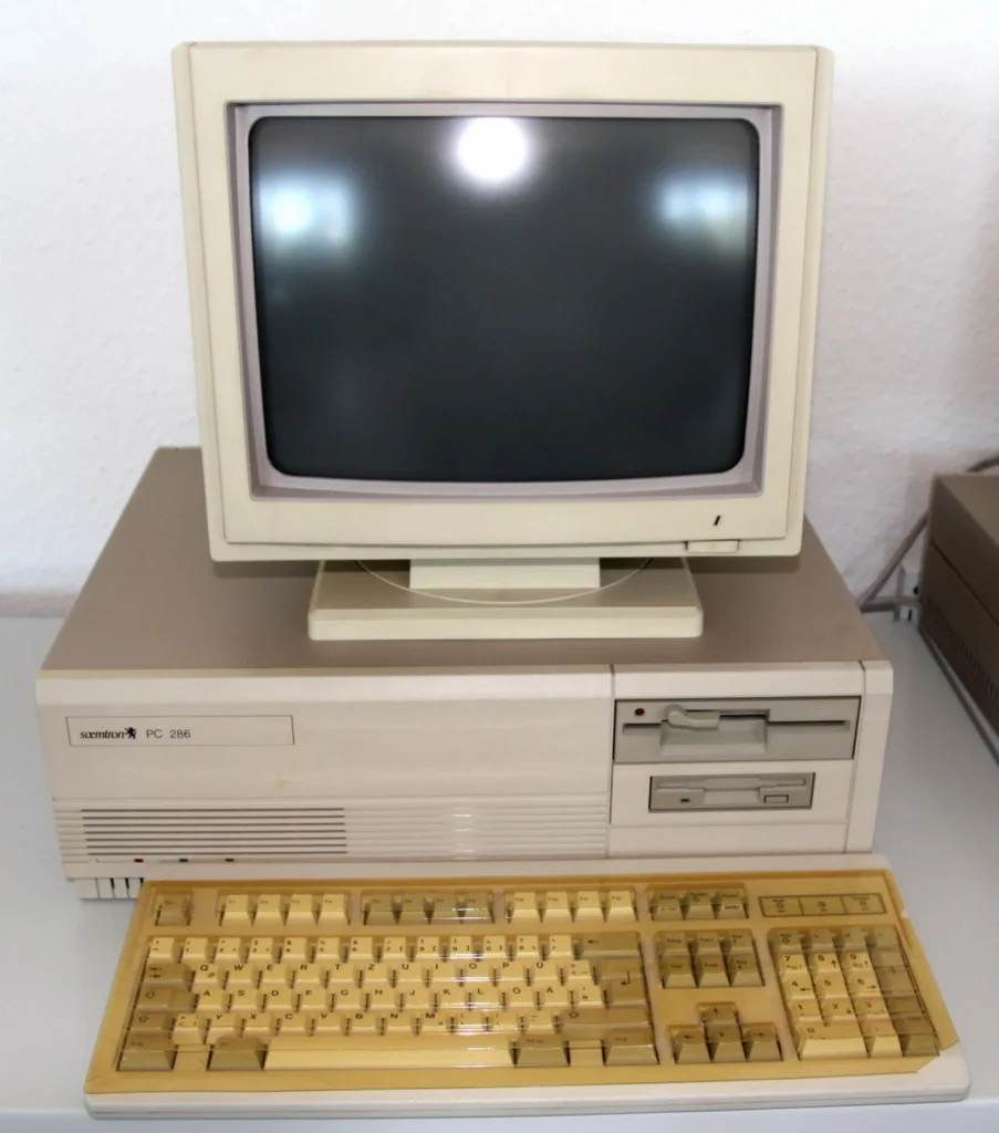 Vintage computer setup on desk.