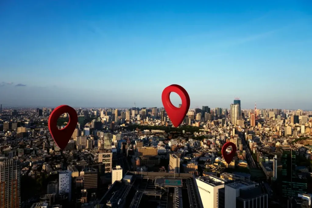 A digital map with location markers over a cityscape, representing location-based search services.